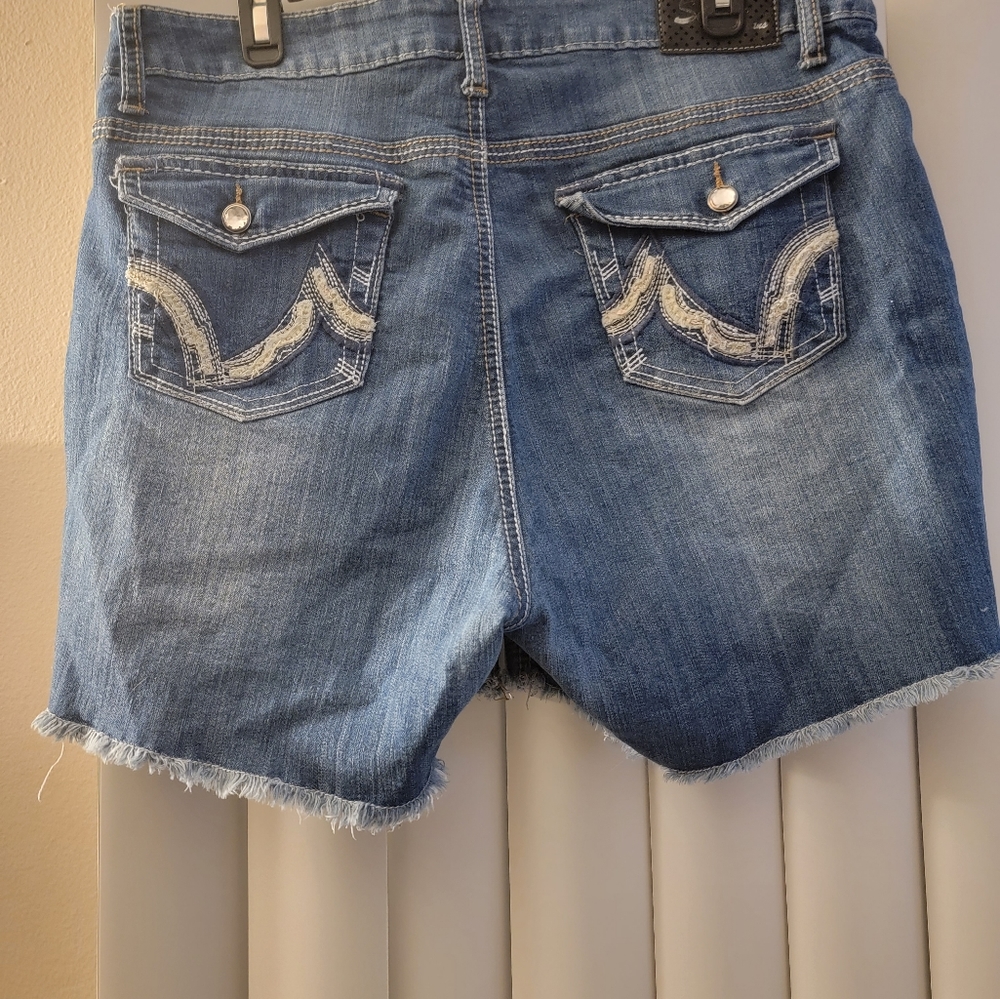 Sizzle Jeans Cutoff Shorts with dazzling details on button and back pockets